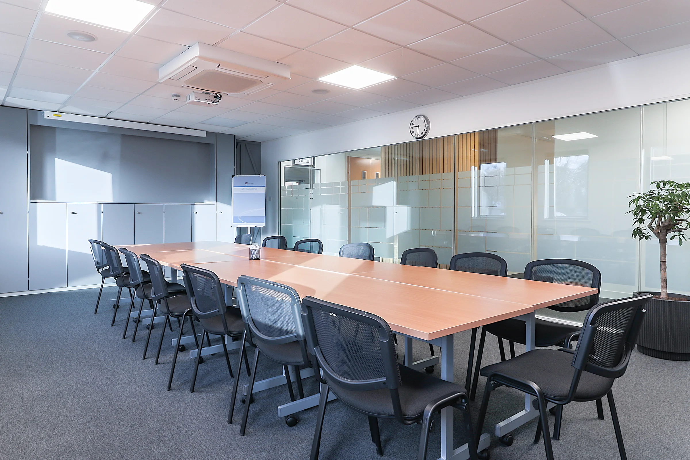 Foundry Suite meeting table and glass partition