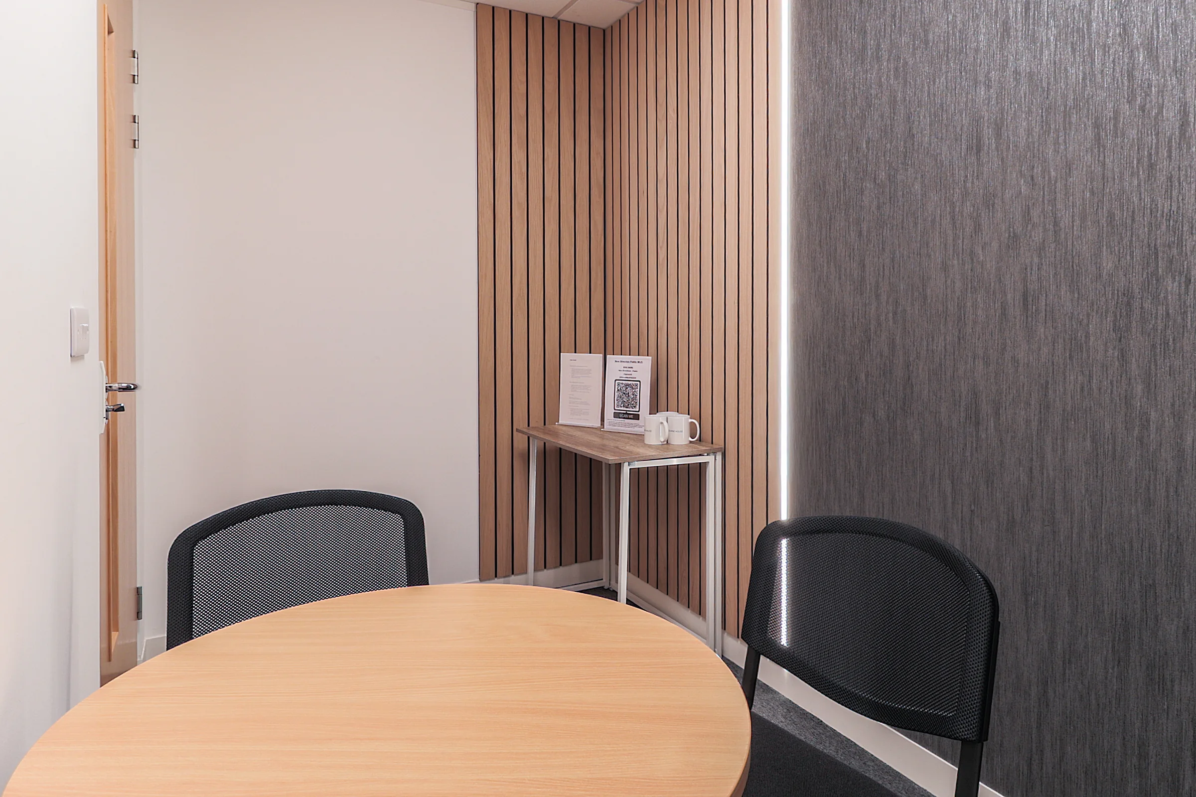 Meeting pod with wood-panel detailing